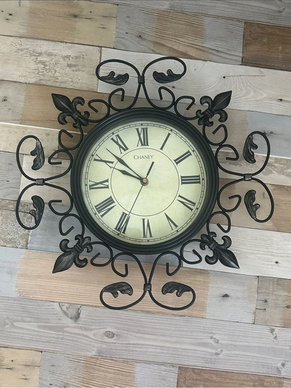 Black Ornate Metal Wall Clock - Decorative Roman Numerals